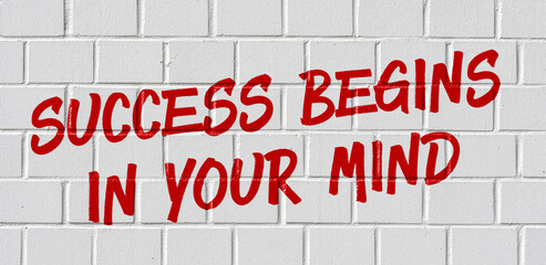 graffiti on a brick wall - success begins in your mind