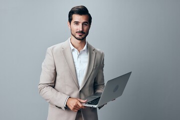 man smiling suit job handsome computer internet freelancer laptop copyspace business