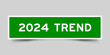 Sticker label with word 2024 trend in green color on gray background
