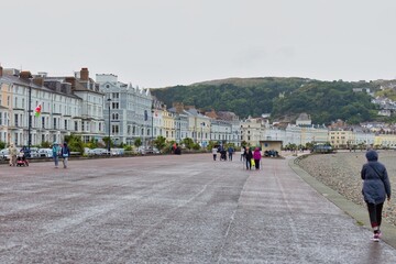 people walking in the city in Llandudno