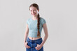 © Daisy Daisy - Studio Portrait Of Happy Smiling And Confident Teenage Girl Looking At Camera