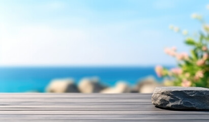 Poster - Empty stone podium on the wooden table with sea view and flower blurred background. For product display