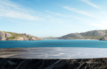 Empty round black marble table for product display montages with sea view background.