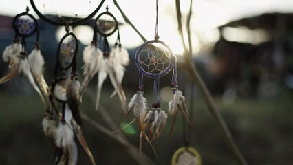 view of dreamcatchers with the sunset in the background in thailand