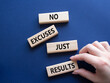 © Natallia - No excuses just results symbol. Wooden blocks with words No excuses just results. Businessman hand. Beautiful deep blue background. Business and No excuses just results concept. Copy space.