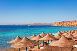 Fototapeta Uliczki - Sunny resort beach on the Red Sea in Sharm el Sheikh, Sinai, Egypt