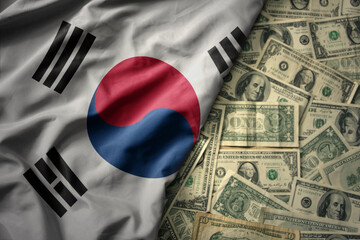 Wall Mural - colorful waving national flag of south korea on a american dollar money background. finance concept