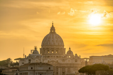 Canvas Print - St. Peter's basilica at sunset in Rome, Italy