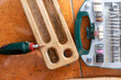© zhukovvvlad - box with accessories for processing and engraving next to an electric tool.