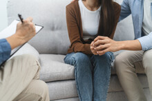 Couple Relationship Therapy With A Counselor. Close Up Hands Of The Woman Client During A Conversation With Psychologist To Find Problems And Solution.