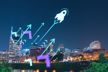 panoramic view of broadway district of nashville over cumberland river at illuminated night skyline,