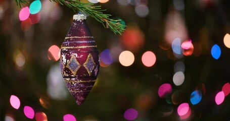 Aufkleber - Christmas tree decorated red toy, Fir branch bell and festive lights on the Christmas background with sparkle and bokeh