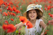 © Evgenia Tiplyashina - A girl in a poppy field