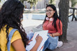 © Marcos - young latin woman with dental braces and university student in Mexico Latin America, hispanic girl studying and holding books