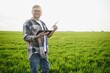 © Serhii - Portrait of senior farmer in wheat field