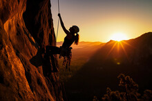 Adventurous Woman, Rock Climbing In Yosemite, Sunrise Lighting Her Silhouette, Warm, Powerful, Inspiring