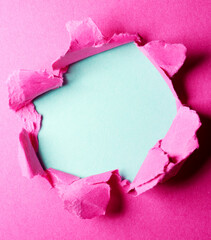 Wall Mural - Pink ripped paper background with hole in the center