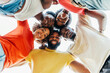 © carlesmiro - Close up portrait of young happy friends standing in circle and looking at camera - Millenial black african and latin people taking selfie - Lifestyle concept with guys and girls hugging together