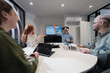 © .shock - A diverse group of businessmen collaborates and tests a new virtual reality technology, wearing virtual glasses, showcasing innovation and creativity in their futuristic workspace