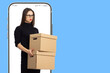 © Grispb - Woman with boxes. Businesswoman in phone screen. Girl holds parcel. Lady with boxes on blue. Businesswoman near copy space. Boxes for documentation in hands of woman. Place for text