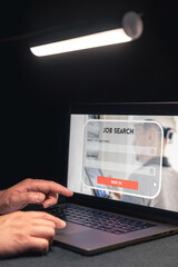 Wall Mural - man working on laptop and information for the searching job, employment concept.