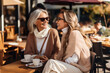 © Kalim - AI generated image of senior mother and daughter on coffee