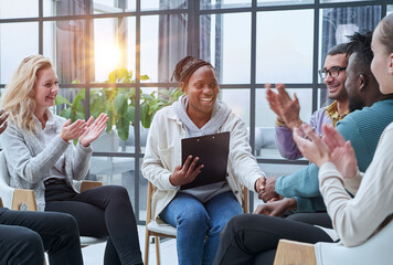 Wall Mural - Business people applauding the coach after the lecture .