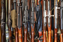 Automatic weapon collection, rifles and machine guns in gun cabinet
