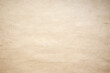 © ckybe - Old pale yellow paper background texture. Wallpaper or backdrop.