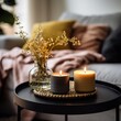 Warm cozy home interior with burning candles, afternoon room decoration, creative decor arrangement
