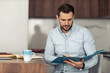 © ivanko80 - Young man working at home