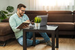 © ivanko80 - Young businessman working at home