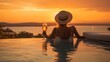 © Lusi_mila - Woman watching the sunset with coctail