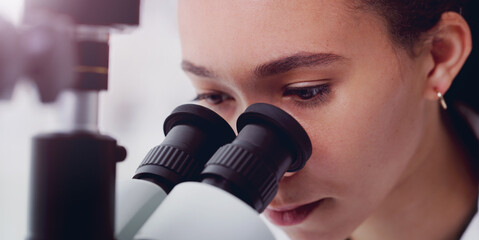 Wall Mural - science, focus and microscope with woman in laboratory for expert research, medical and planning. te