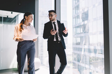 Sticker - Confident colleagues walking in office hall