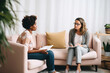 © kalafoto - A therapist conducting a counseling session with a patient.