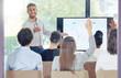 © ChasingMagic/peopleimages.com - Seminar, business people and hands raised with chart, question and financial data analysis for economy. Finance team, boss or speaker with graph, discussion and information with collaboration at job