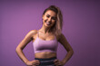 © Mr. Bolota - Fit and Fabulous: Smiling fitness trainer showing exercises isolated on pastel purple background with space for text. Copy space. Fitness concept. AI Generative