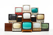 © ink drop - A collection of old vintage retro tv television sets in a stack