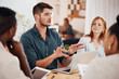 © Mikolette Moller/peopleimages.com - Setting out some clear objectives. Shot of a young businessman having a meeting with his colleagues in an office.