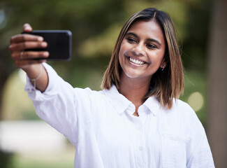 Wall Mural - Selfie, smile and student with woman in park for social media, relax and happy. College campus, influencer and happiness with female person in nature for profile picture, blog and gen z post