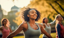 Group Of Multiethnic Women Stretching Arms Outdoor. Yoga Class Doing Breathing Exercise At Park. Beautiful  Fit Women Doing Breath Exercise Together With Outstretched Arms. 