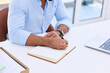 © Martina Monti/peopleimages.com - Business man, hands and writing in notebook at desk for planning summary, company report and review with laptop. Closeup, employee and notes for agenda, schedule and planner for information in office