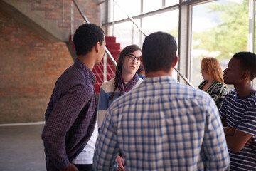Aufkleber - Catching up between their breaks. Cropped shot of a group of university students hanging out between class.