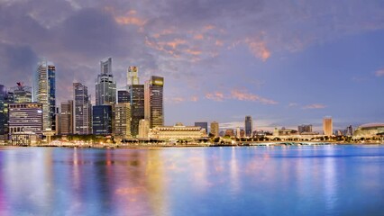 Wall Mural - Singapore cityscape at night with city view time lapse video, in the style of light teal and light purple at Marina bay area.