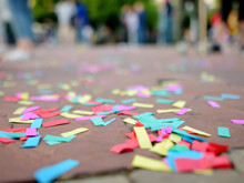 Multicolour Paper Ticker-tape Lies On The Ground After Celebration Of Wedding, Birthday, Carnival, Lgbt Pride Parade Or Outdoors Festival. After Party.