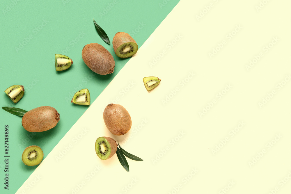 Fresh kiwi and leaves on colorful background