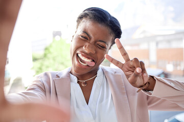 Poster - Happy black woman, peace sign and selfie in city with tongue out for photograph, memory or vlog outdoors. Face of female person or employee smile for fun picture, humor or happiness in an urban town