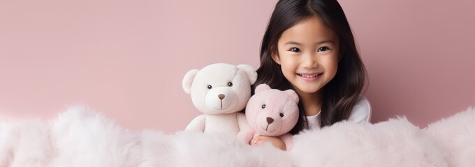 Wall Mural - Portrait of Asian girl playing with toy bear doll