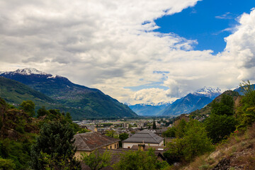 Canvas Print - Panoramic view from a hill over City of Sion with and Swiss Alps in Canton Valais, Switzerland